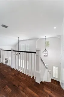 a view of entryway with wooden floor