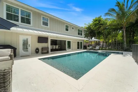 a view of a house with a swimming pool