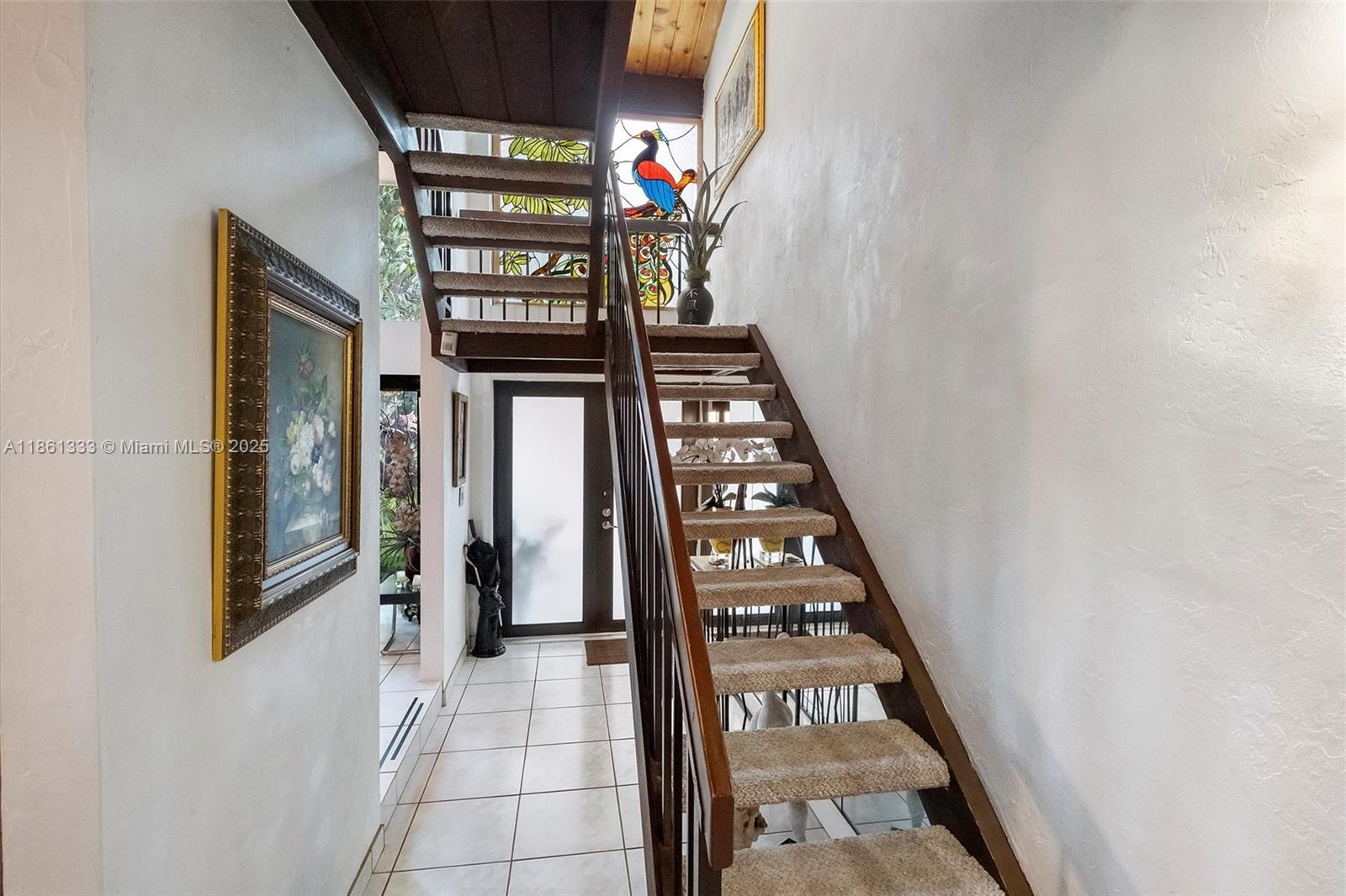 10409 Southwest 80th Street Miami, FL 33173 - Photo 17 of 35 a view of an entryway with a door