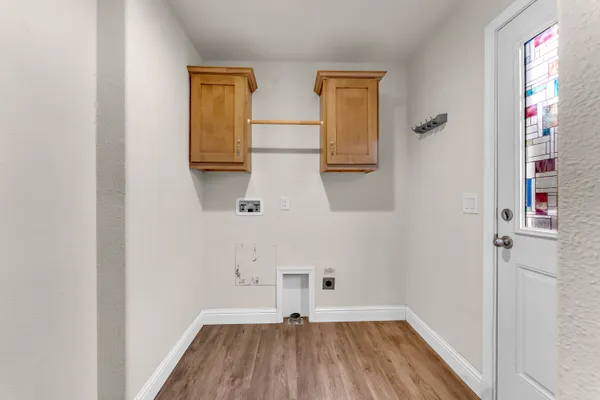 an aerial view of a residential houses with outdoor space