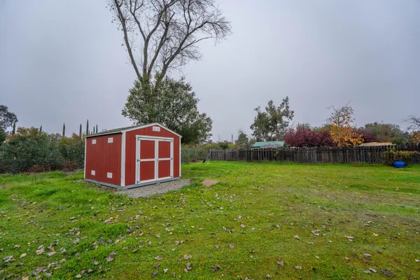 a view of garage with garage