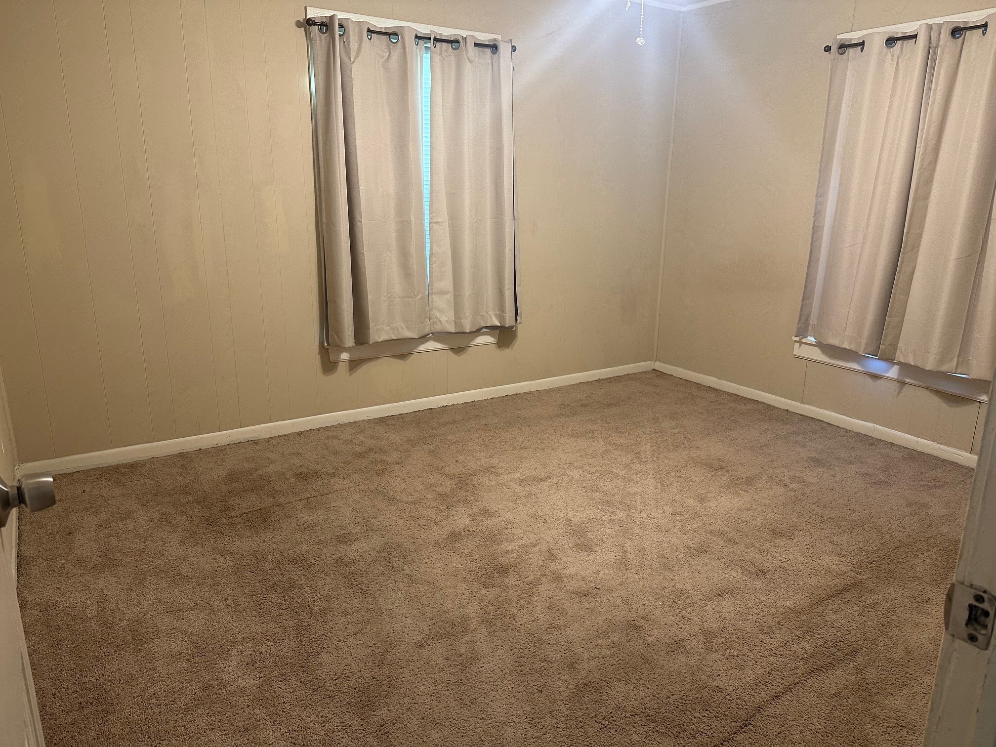 324 Azalea Street Lake Jackson, TX 77566 - Photo 7 of 7 an empty room with windows