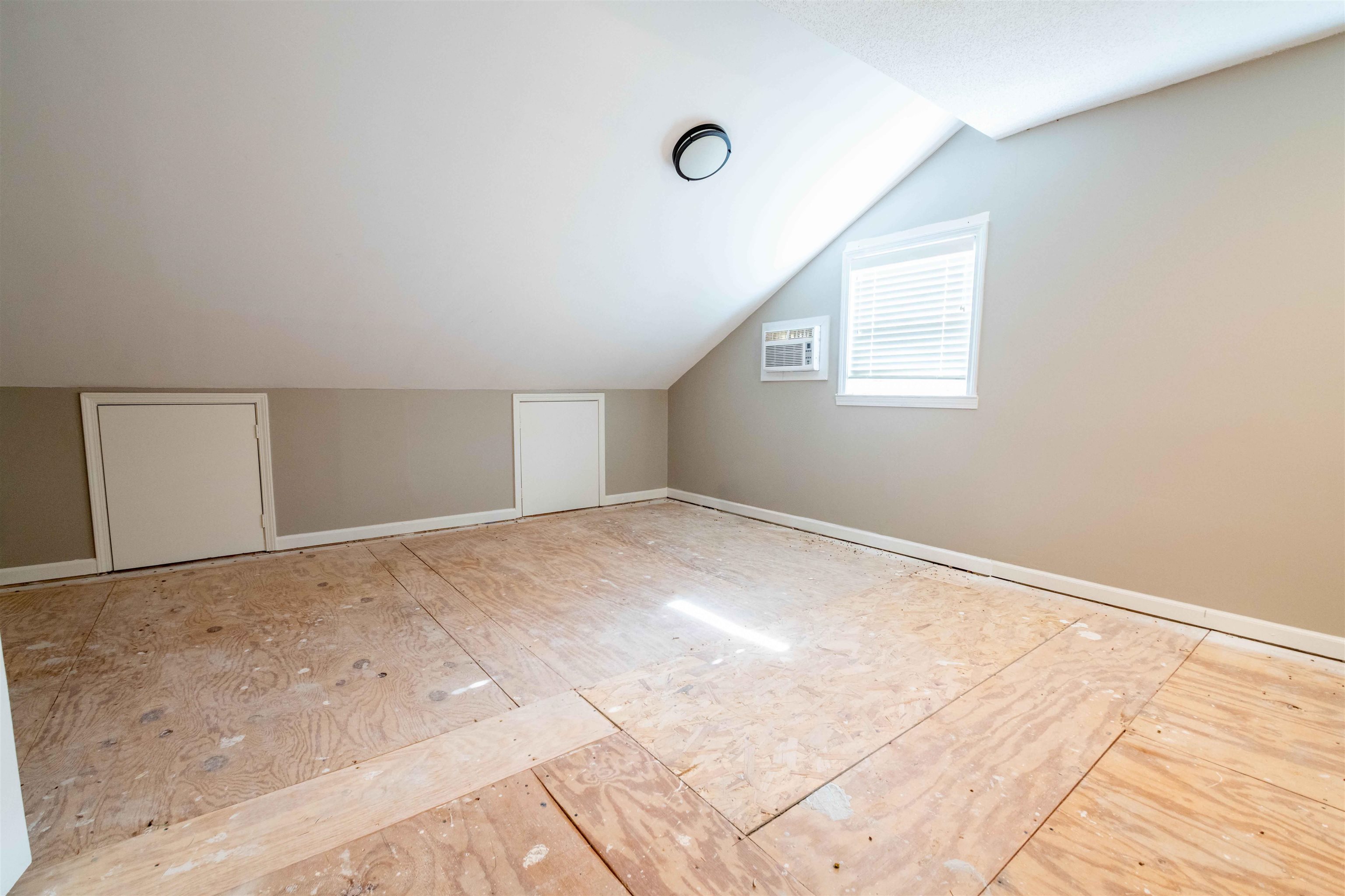 1239 Whitten Road Memphis, TN 38134 - Photo 14 of 24 Bonus room featuring lofted ceiling and a wall mounted AC