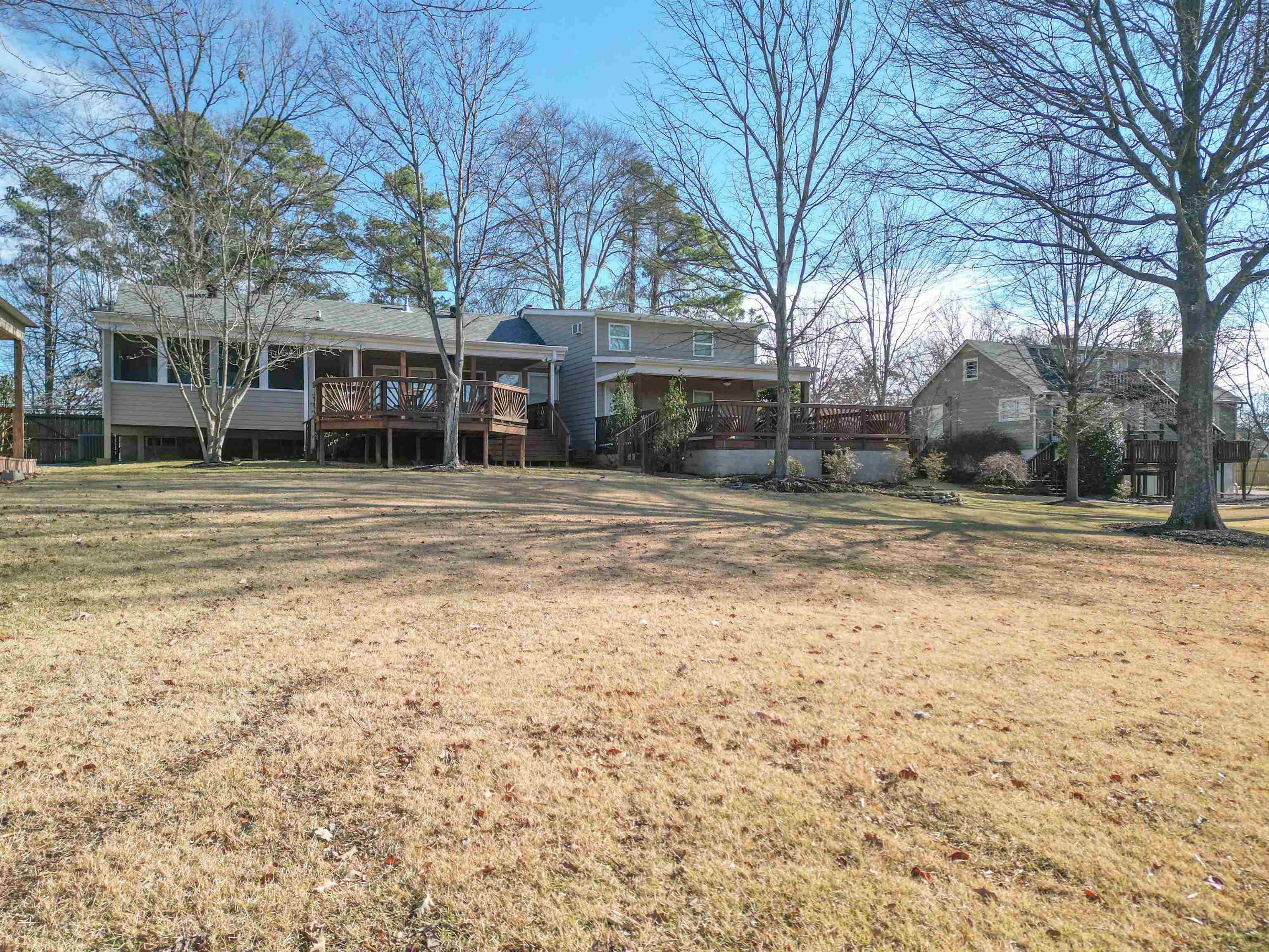 1239 Whitten Road Memphis, TN 38134 - Photo 3 of 24 View of front of house with a deck and a front lawn