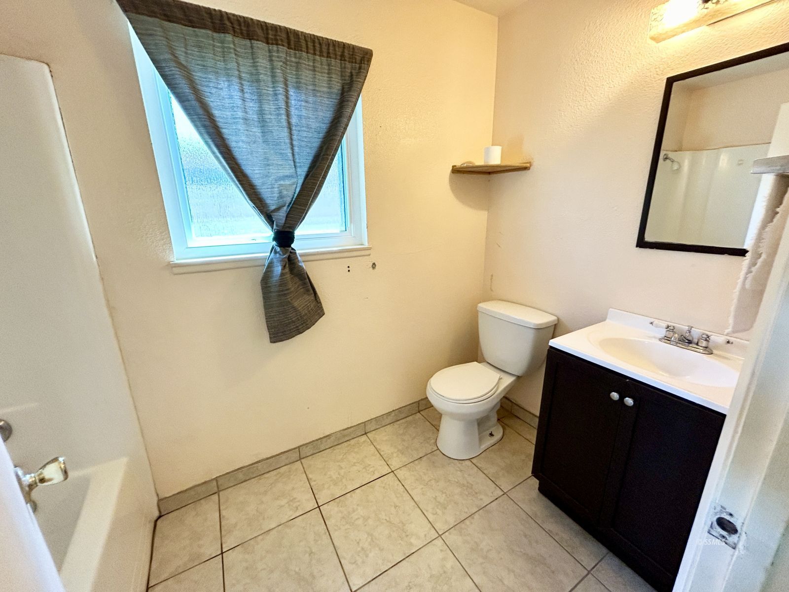 513 Indian Wells Lane Ridgecrest, CA 93555 - Photo 7 of 15 a bathroom with a toilet and a sink