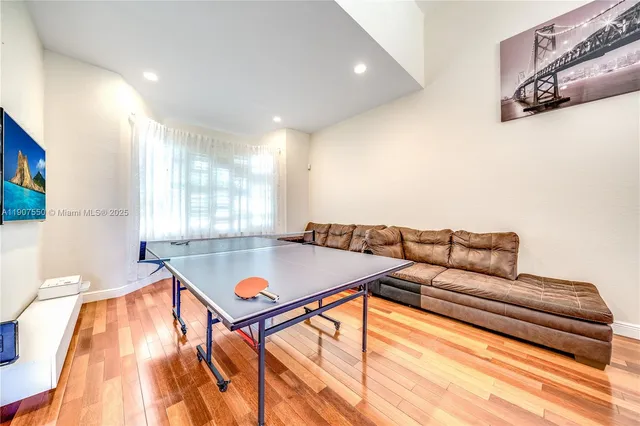 a living room with a couch and a table