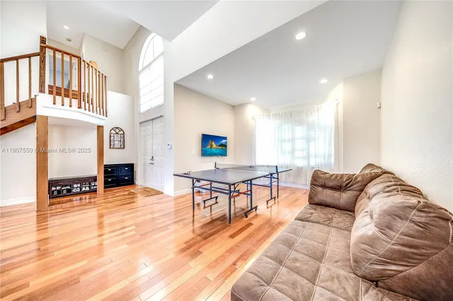 a living room with furniture and a table