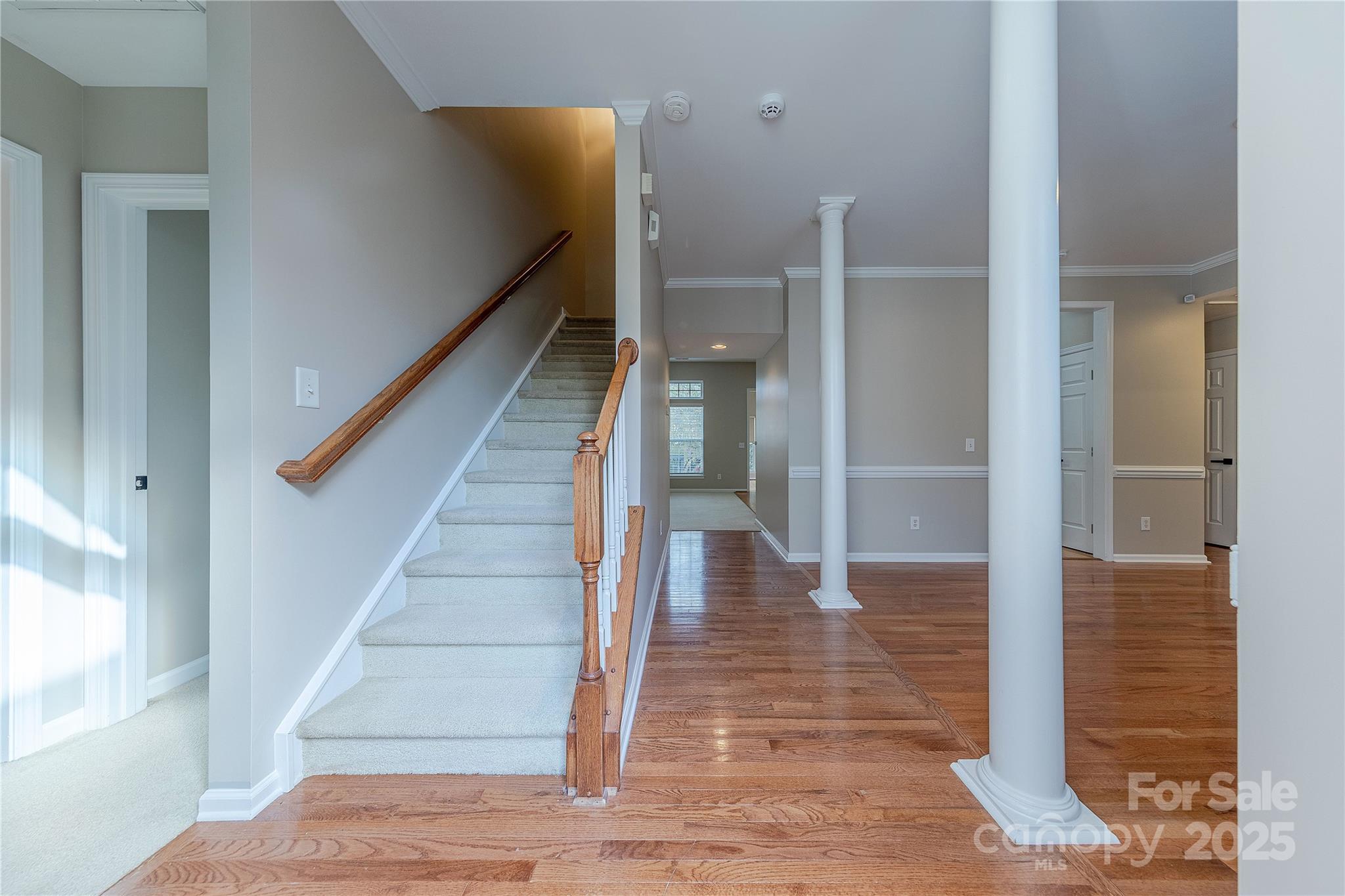 7216 Meyer Road Fort Mill, SC 29715 - Photo 2 of 47 a view of entryway and hall with wooden floor