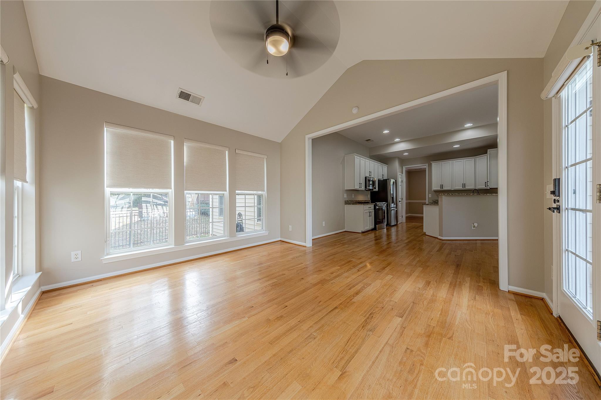 7216 Meyer Road Fort Mill, SC 29715 - Photo 23 of 47 a view of empty room with wooden floor and a window