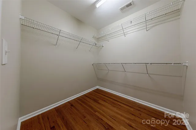 a view of a room with racks on the wall