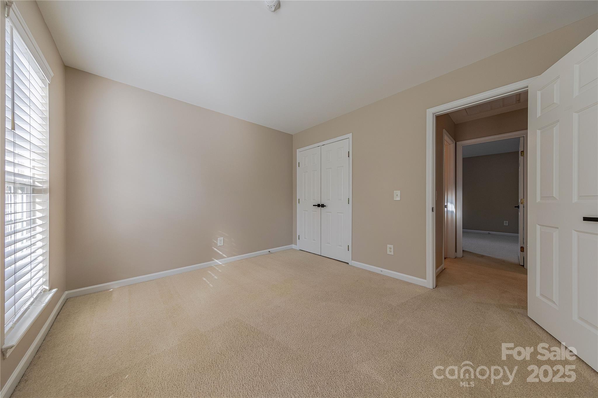 7216 Meyer Road Fort Mill, SC 29715 - Photo 33 of 47 an empty room with windows and closet