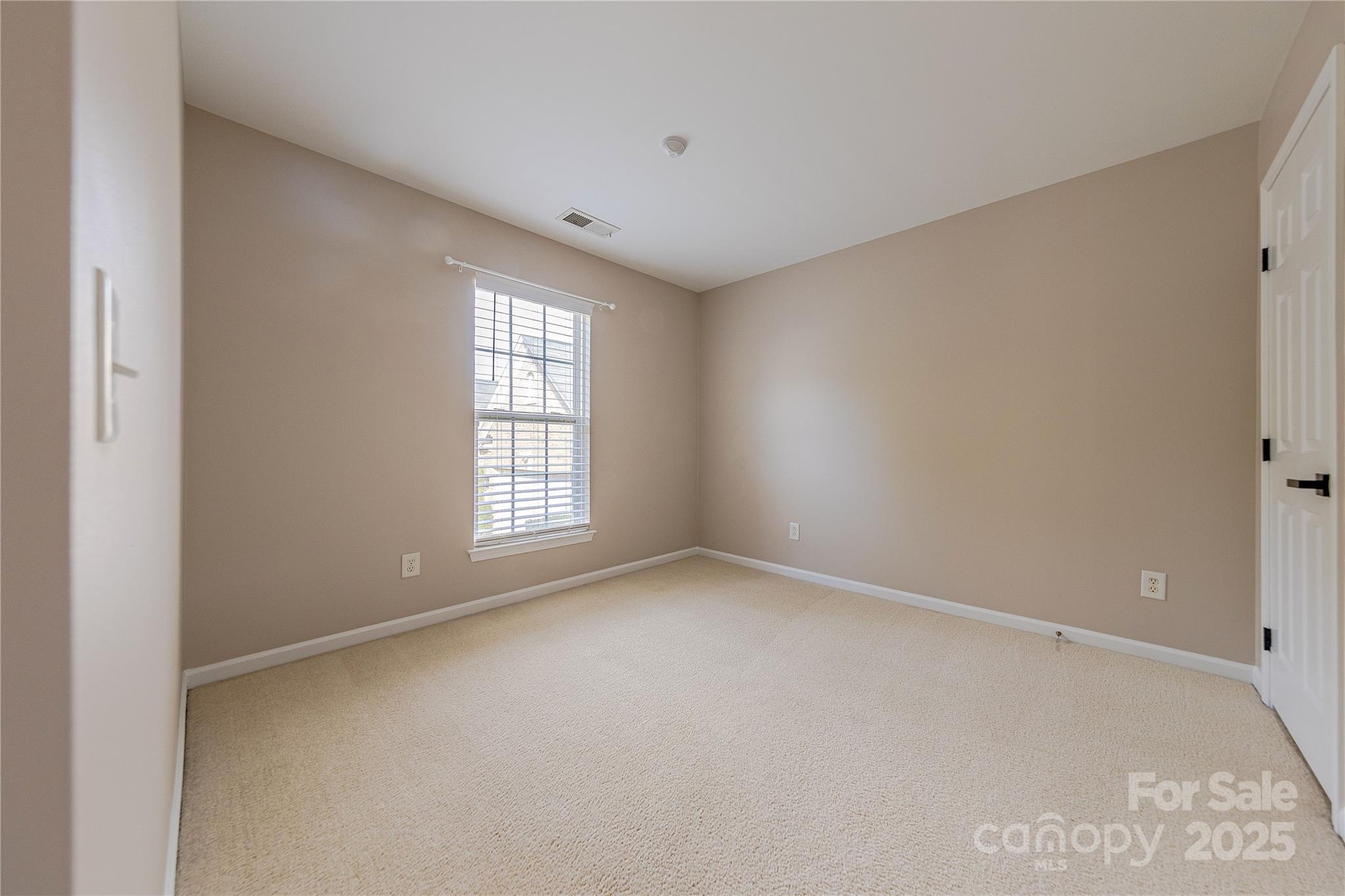 7216 Meyer Road Fort Mill, SC 29715 - Photo 34 of 47 a view of an empty room with a window