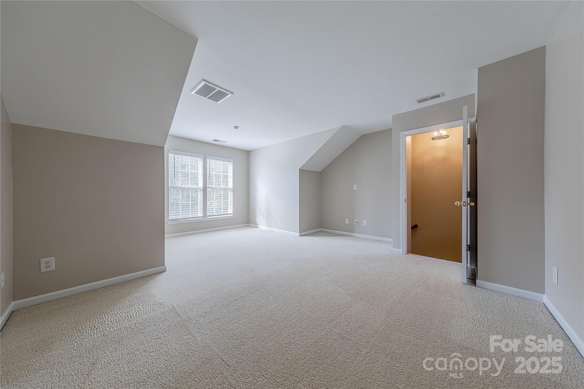 7216 Meyer Road Fort Mill, SC 29715 - Photo 38 of 47 a view of an empty room with windows and closet
