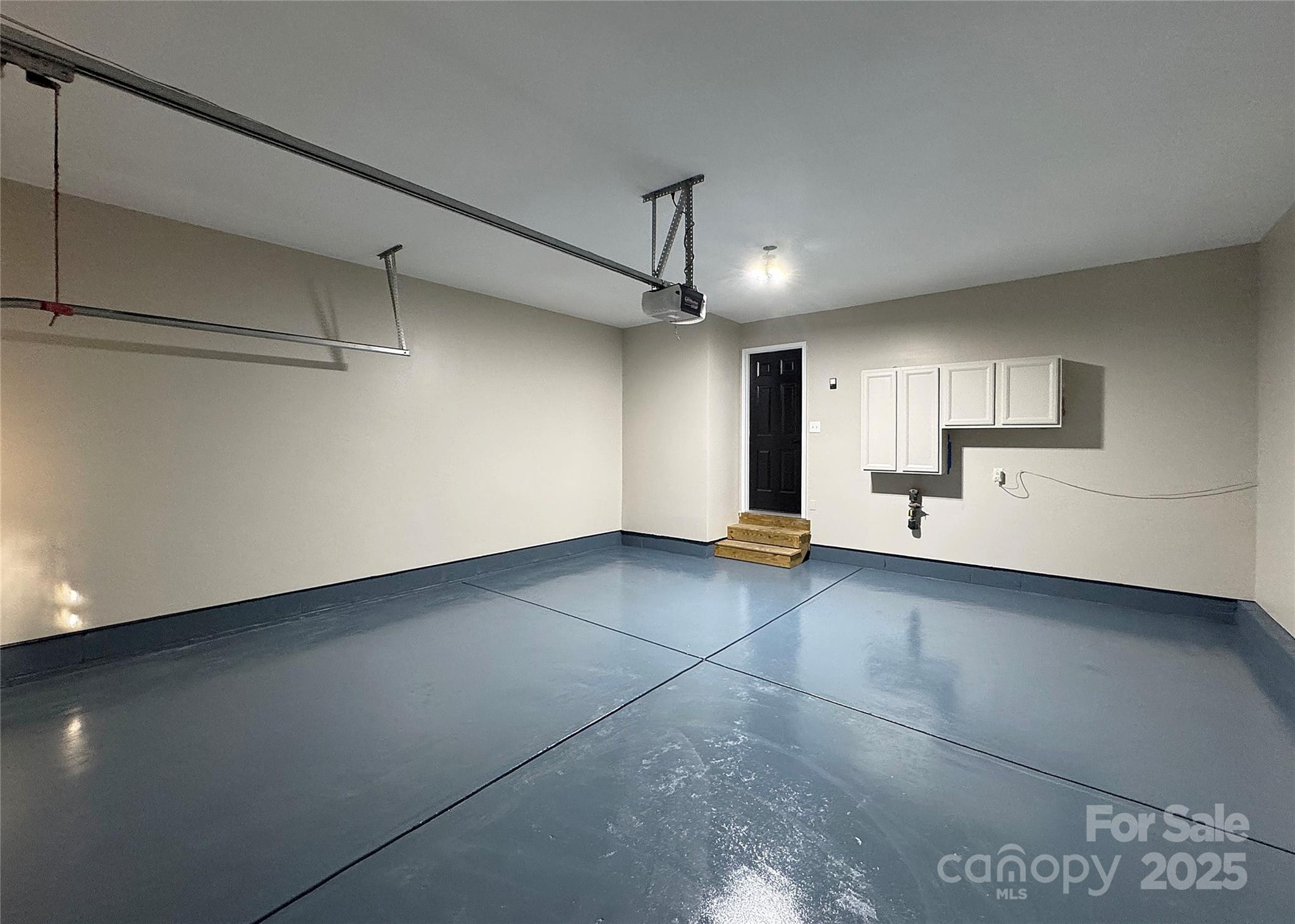 7216 Meyer Road Fort Mill, SC 29715 - Photo 40 of 47 a view of a kitchen with a dishwasher and white cabinets