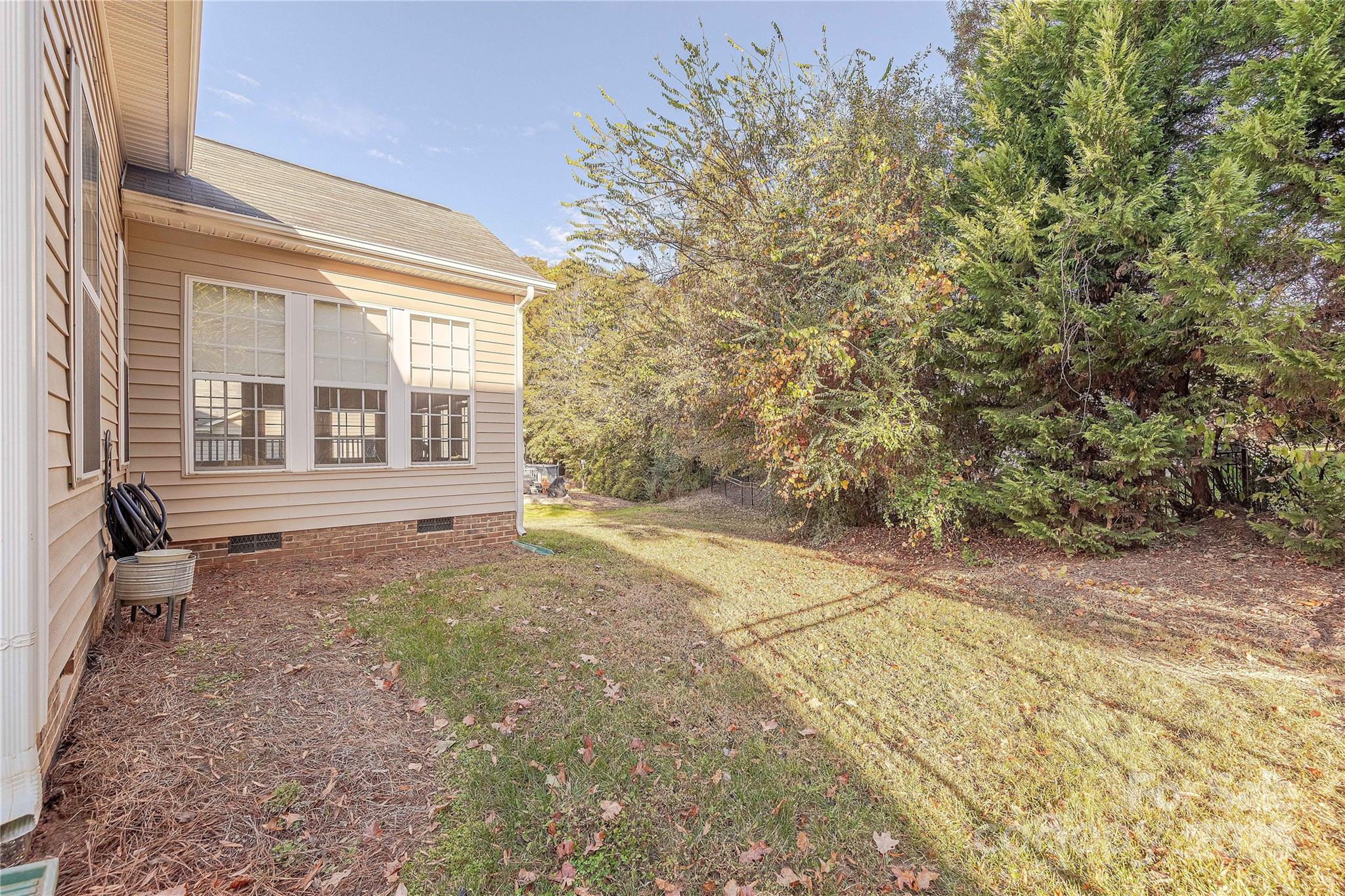 7216 Meyer Road Fort Mill, SC 29715 - Photo 43 of 47 a view of a backyard with large trees
