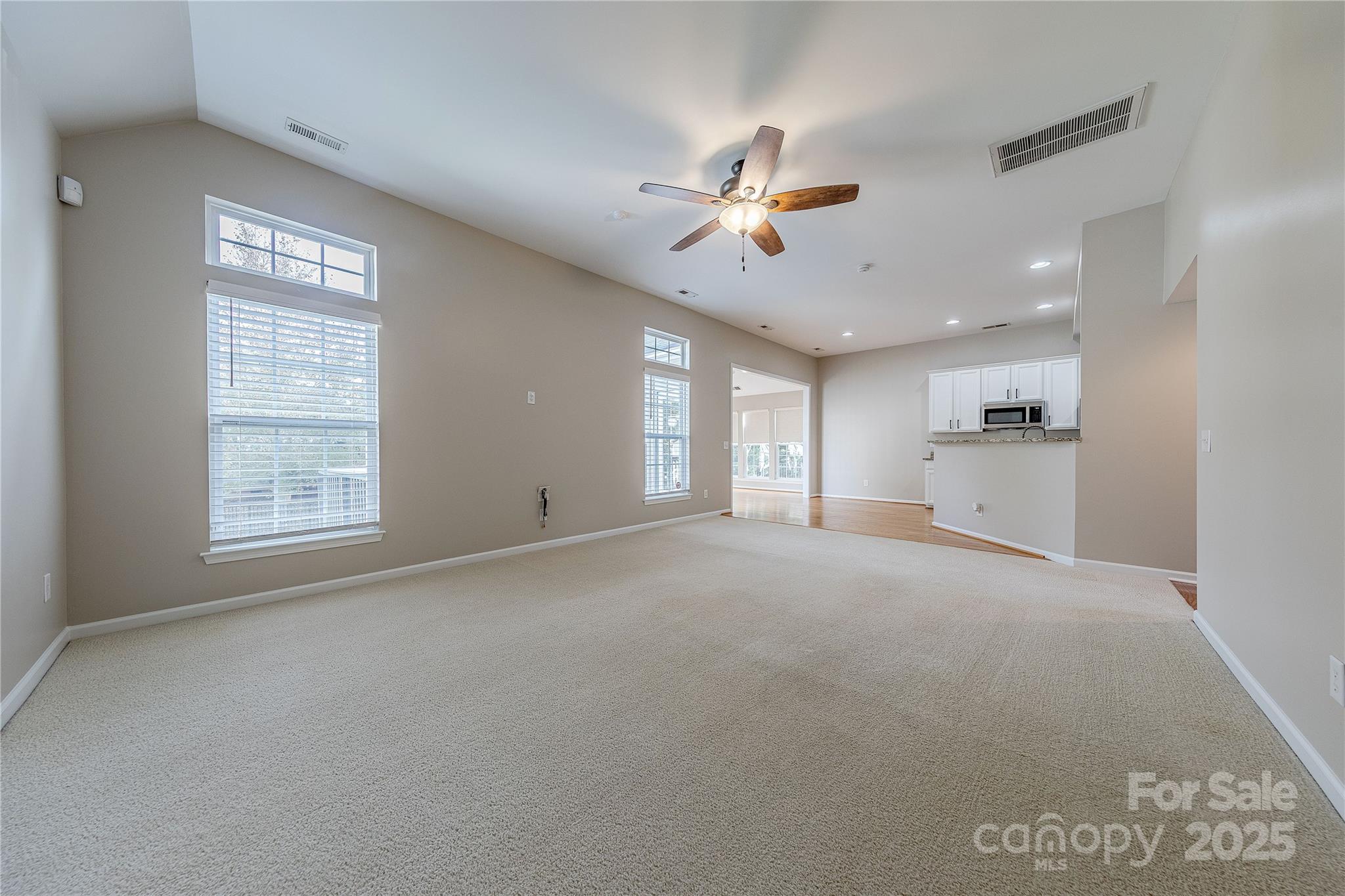7216 Meyer Road Fort Mill, SC 29715 - Photo 8 of 47 a view of an empty room with a window