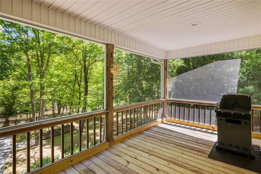 704 Riverbend Road Blairsville, GA 30512 - Photo 68 of 89 a view of a balcony with wooden floor