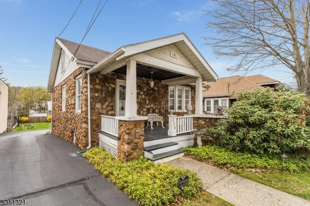 front view of a house with a small yard
