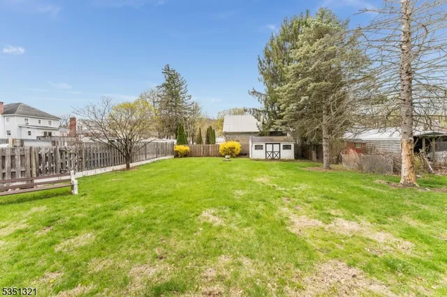 a house view with garden space