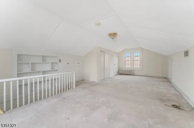a view of livingroom with furniture and windows