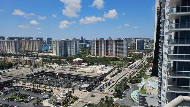 a view of a city with tall buildings