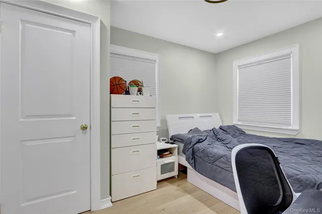 a bedroom with a bed and a closet
