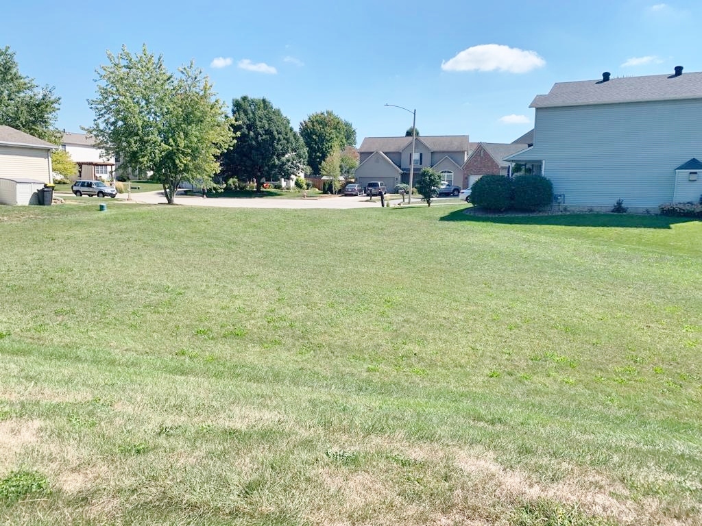 1707 Setter Street Normal, IL 61761 - Photo 4 of 8 a view of a field of grass and trees