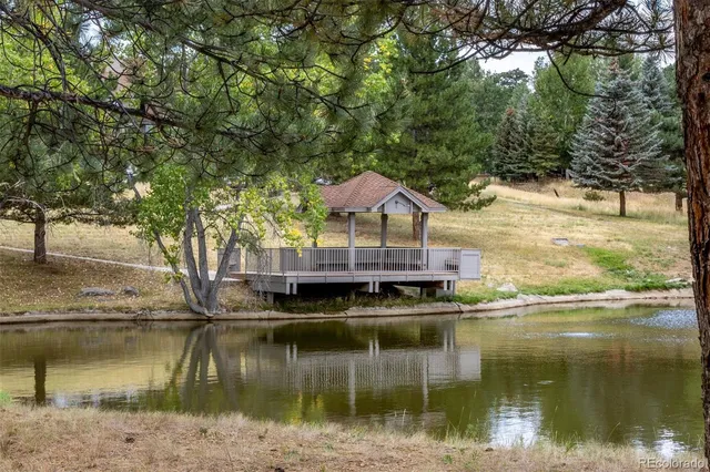 a view of house with river in front of house