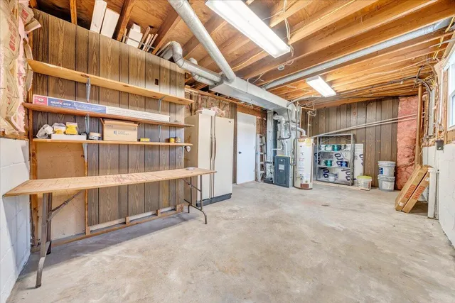 a view of an empty room with furniture