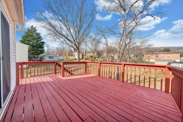 a view of a tiny house with a yard