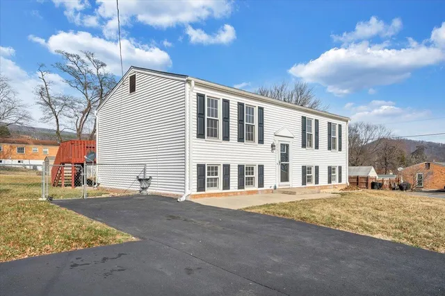 a view of building with yard