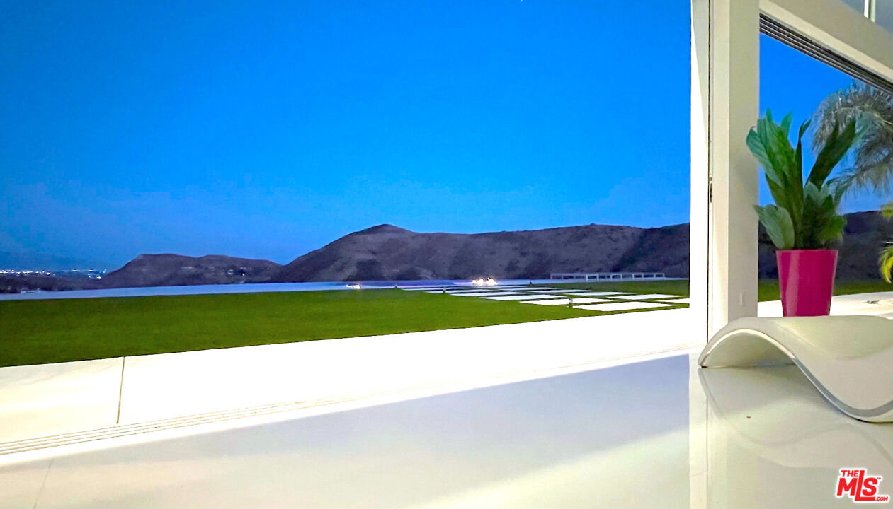 80 Saddlebow Road Bell Canyon, CA 91307 - Photo 15 of 37 a view of a swimming pool with an outdoor space and seating area