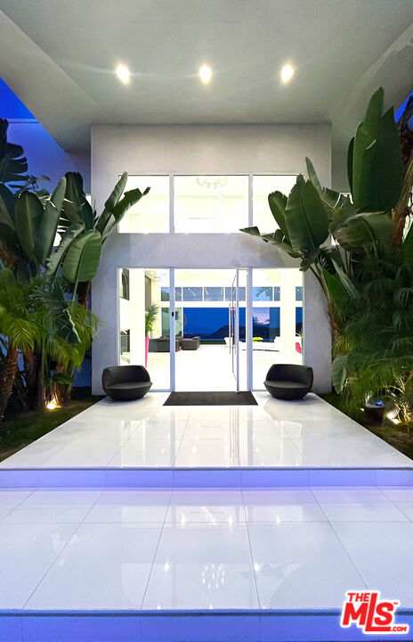 80 Saddlebow Road Bell Canyon, CA 91307 - Photo 22 of 37 a view of living room with furniture and potted plants