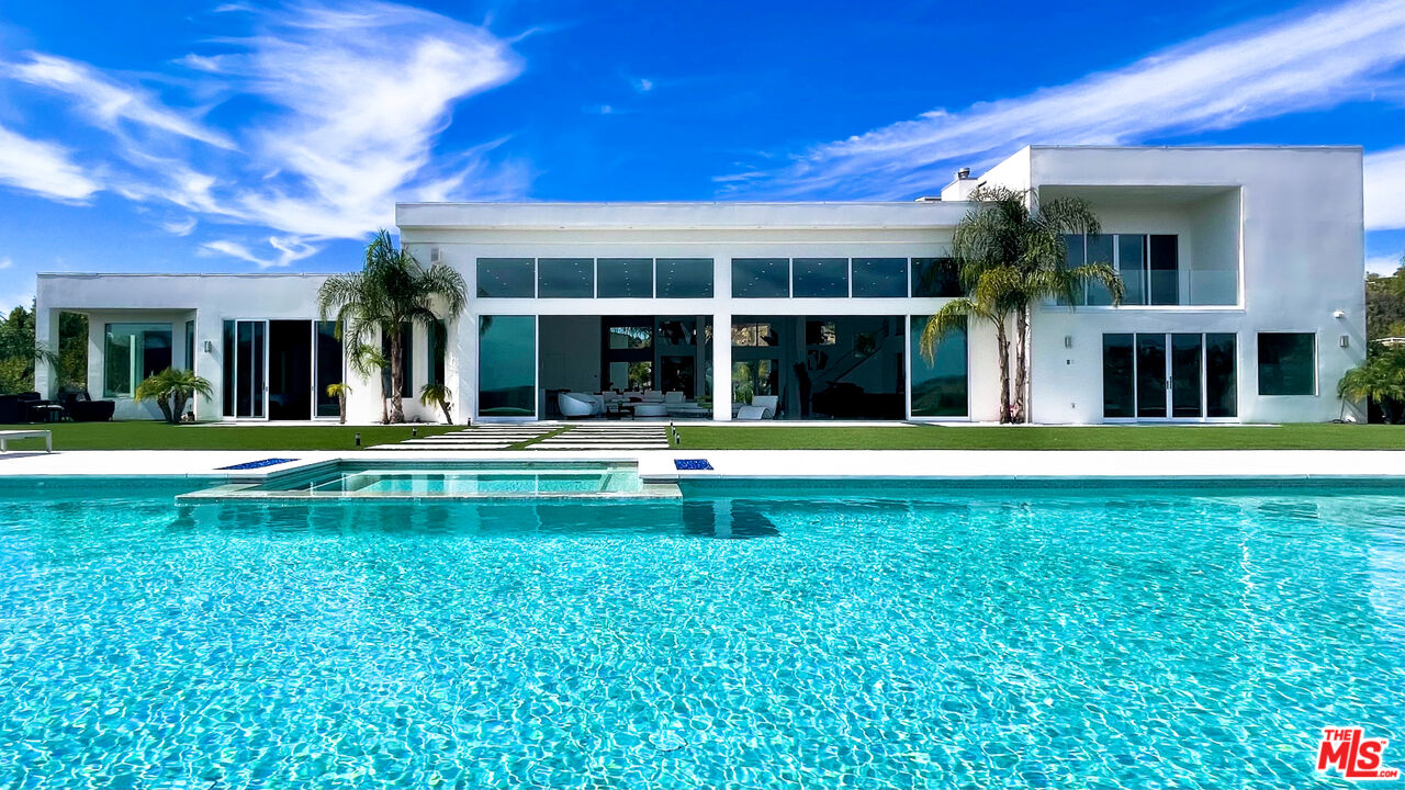 80 Saddlebow Road Bell Canyon, CA 91307 - Photo 37 of 37 a swimming pool with outdoor seating