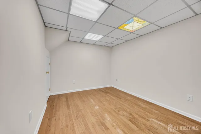 a kitchen with a sink and a refrigerator