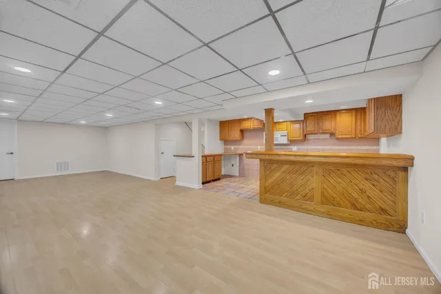 a view of an empty room with empty shelves