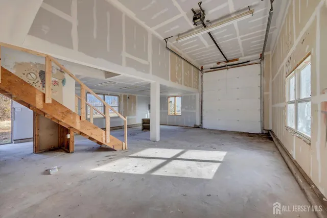a view of backyard with a deck and wooden floor