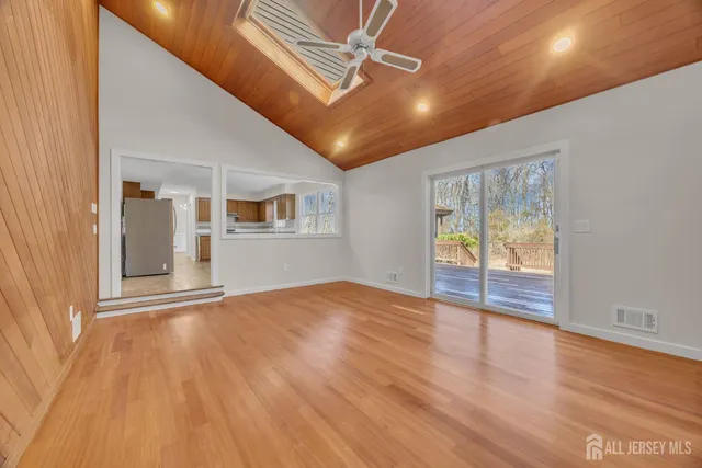 a kitchen with stainless steel appliances a refrigerator a sink dishwasher stove and oven