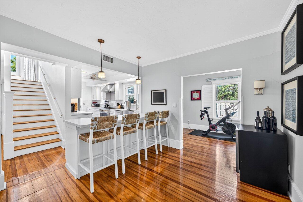 307 Wildermere Road West Palm Beach, FL 33401 - Photo 11 of 54 a view of a dining room with furniture window and wooden floor