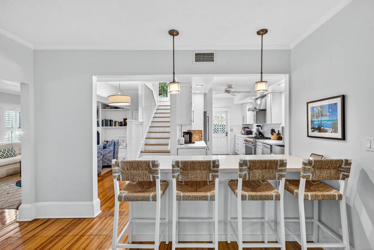 307 Wildermere Road West Palm Beach, FL 33401 - Photo 12 of 54 a dining room with furniture and wooden floor