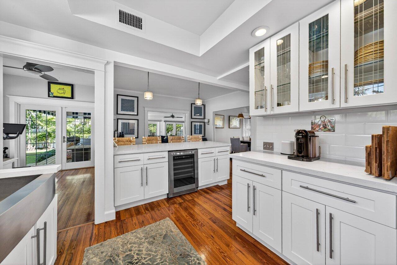 307 Wildermere Road West Palm Beach, FL 33401 - Photo 15 of 54 a kitchen with cabinets oven and a wooden floor