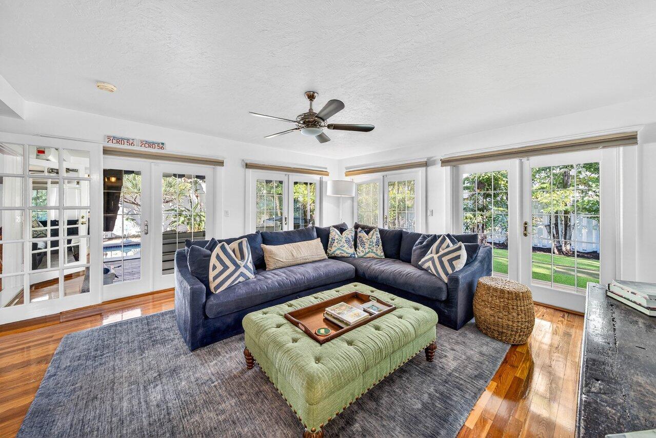307 Wildermere Road West Palm Beach, FL 33401 - Photo 18 of 54 a living room with furniture and a large window with wooden floor