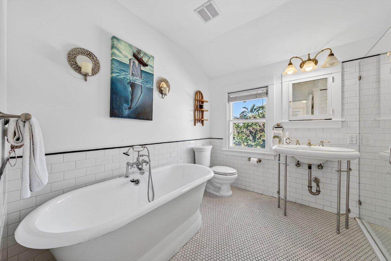 307 Wildermere Road West Palm Beach, FL 33401 - Photo 30 of 54 a bathroom with a sink and a mirror