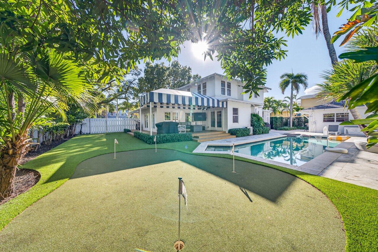 307 Wildermere Road West Palm Beach, FL 33401 - Photo 3 of 54 a view of a house with swimming pool