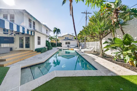 a view of a house with a swimming pool