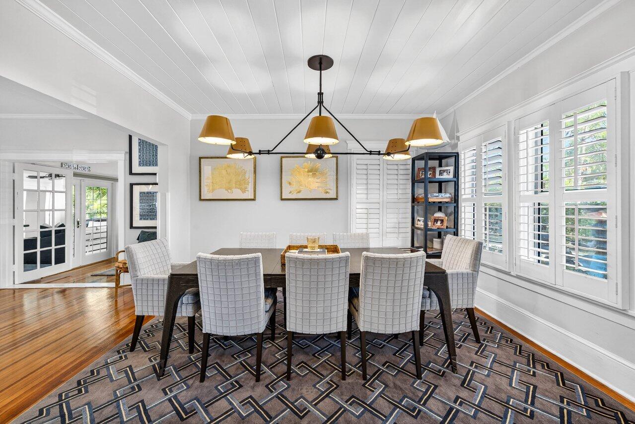 307 Wildermere Road West Palm Beach, FL 33401 - Photo 10 of 54 a view of a dining room with furniture wooden floor and chandelier