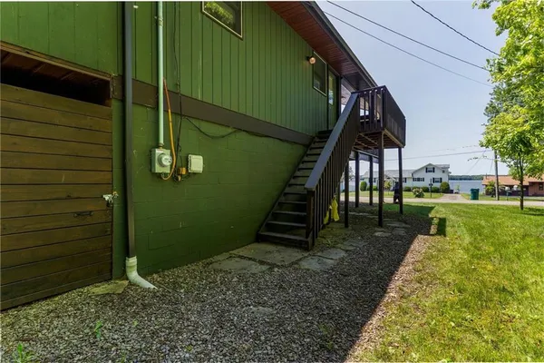 a dining room with furniture window and wooden floor