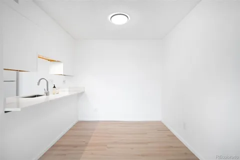 a view of a kitchen with sink and dishwasher