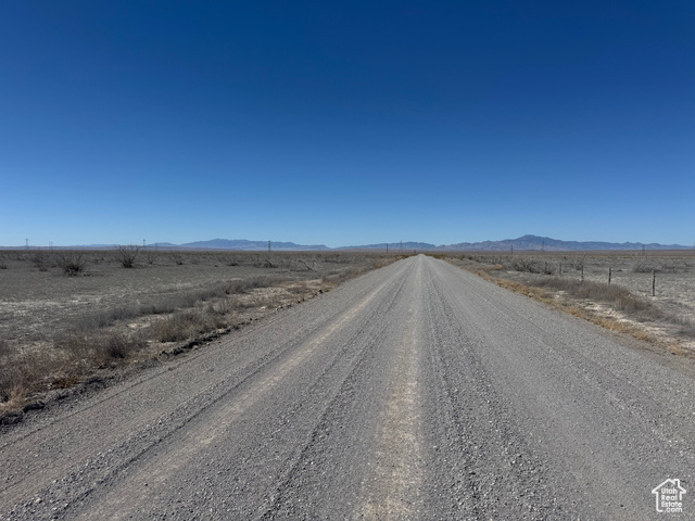 16800 West 2500th South Delta, UT 84624 - Photo 1 of 10 View of dirt / gravel road with a rural view and a mountain view