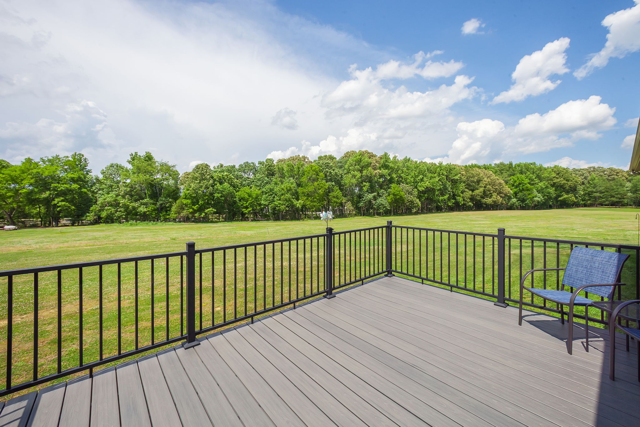 745 Alman Cemetery Road Paris, TN 38242 - Photo 21 of 31 a view of balcony with wooden floor & fence